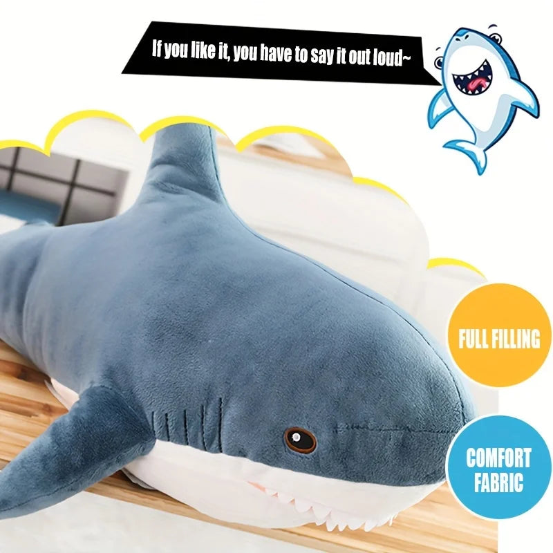 Shark plush on bed